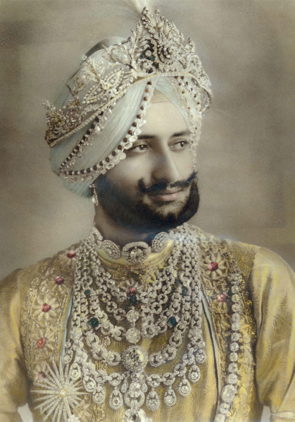 The Maharajah of Patiala In this 1928 photograph from the New York Herald, Sir Yadavindra Singh, Maharaja of Patiala, wears a platinum-and-diamond ceremonial necklace created by Cartier for his father, Sir Bhupindar Singh. © Cartier Archives 