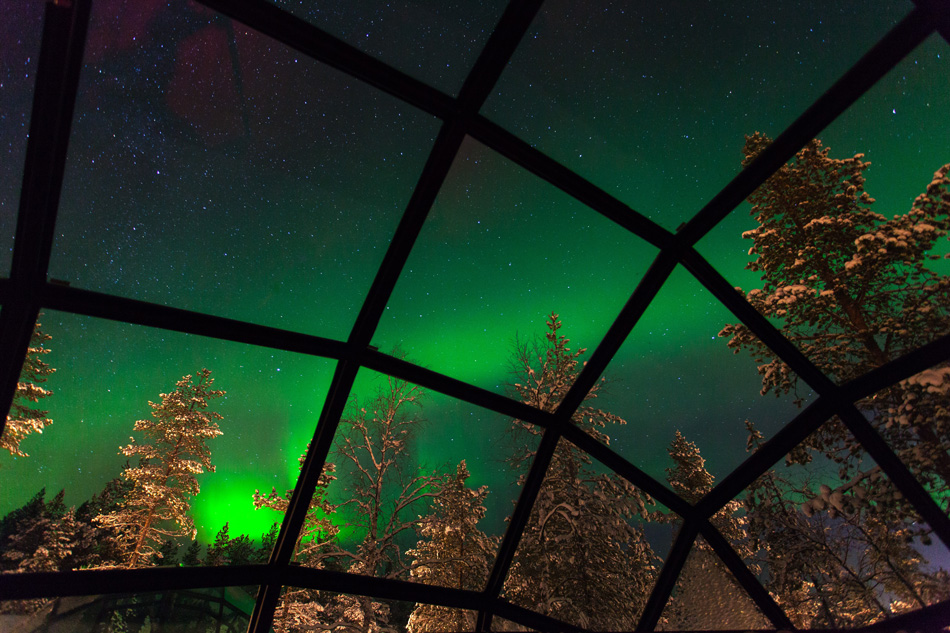 Watch the Aurora Borealis from your bed at Kakslauttanen Resort