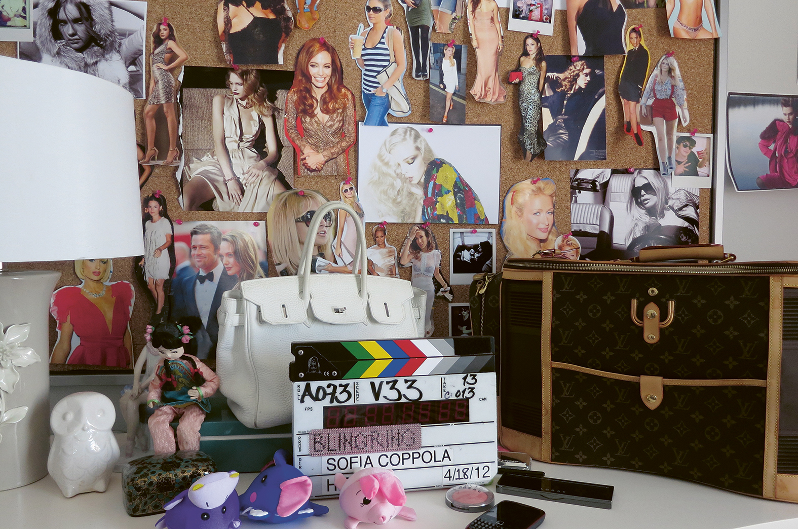 poster advertising Louis Vuitton with Sofia Coppola in paper